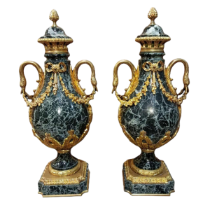 Pair of Louis XVI style marble and gilt bronze covered urns, XIXth c