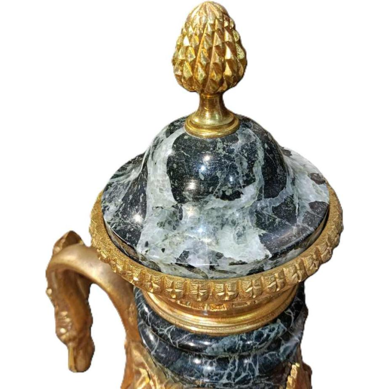 Pair of Louis XVI style marble and gilt bronze covered urns, XIXth c