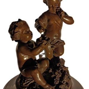Jean-Baptiste REVILLON, Napoleon III klok met groep bronzen putti, 19de eeuw