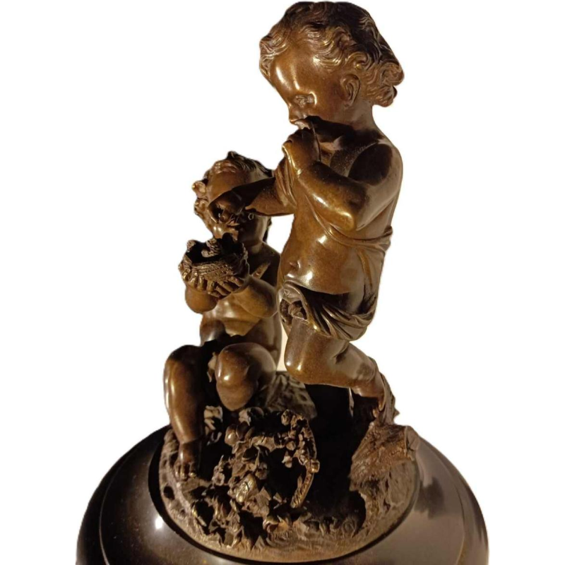 Jean-Baptiste REVILLON, Napoleon III clock with group of bronze putti, 19th c