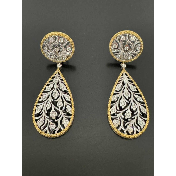 Pair of two-tone gold earrings set with diamonds