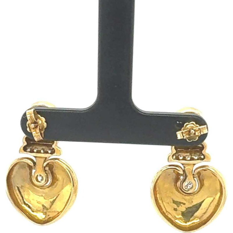 Paar oorbellen, geel goud, diamanten en robijnen