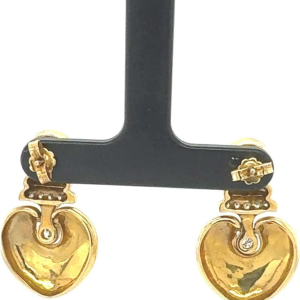 Pair of earrings, yellow gold, diamonds and rubies