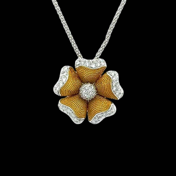 Pendentif 'Fleur' en or bicolore avec diamants