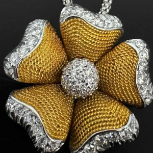 Pendentif 'Fleur' en or bicolore avec diamants