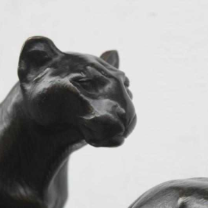 Pair of bronze lionesses by Louis Riche, French sculptor
