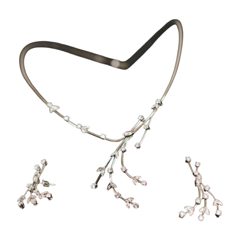 Set (collier en paar oorbellen) in witgoud en diamant