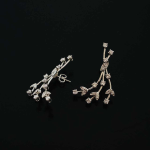 Set (collier en paar oorbellen) in witgoud en diamant