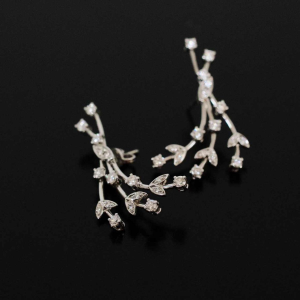 Set (collier en paar oorbellen) in witgoud en diamant