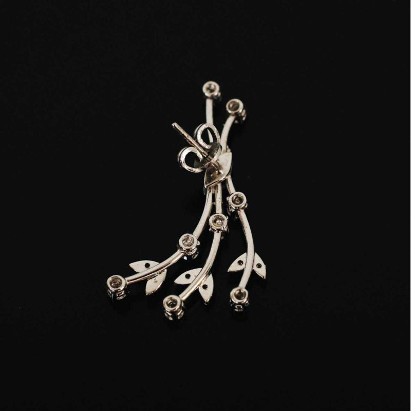 Set (necklace and pair of earrings) in white gold and diamonds