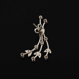 Set (necklace and pair of earrings) in white gold and diamonds