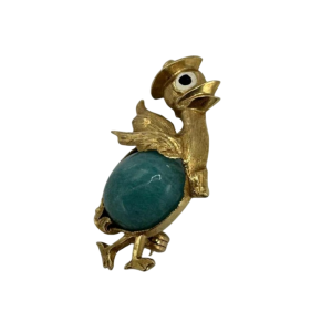 Kleine broche in 18 karaat geelgoud bezet met een turquoise steen. Circa 1970
