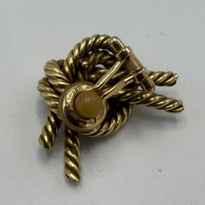 Hermès voor Georges Lenfant 'Noeud marin' 18 K geel goud oorbellen ooreclips