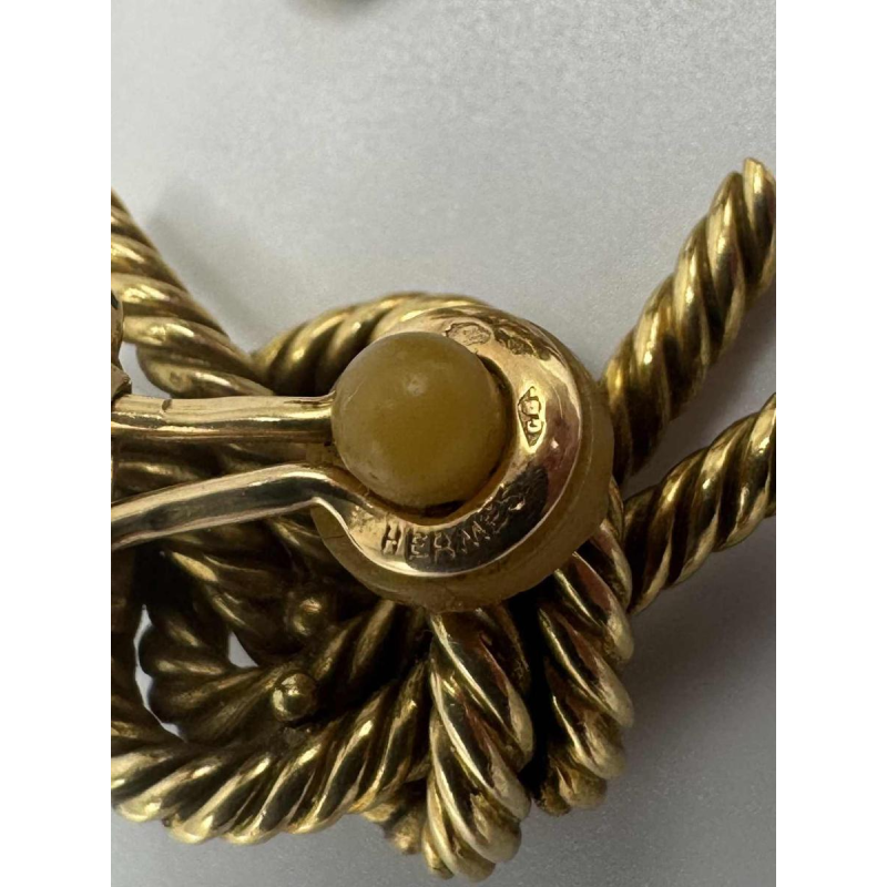Hermès by Georges Lenfant 'Noeud marin' model, 18 K yellow gold clip earrings