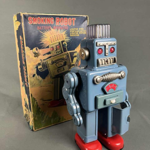 Smoking Spaceman Robot in blue metal in original box, Yonezawa Japan, ca 1960