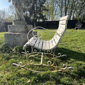 Wrought iron rocking armchair with scrolls, late 19th c