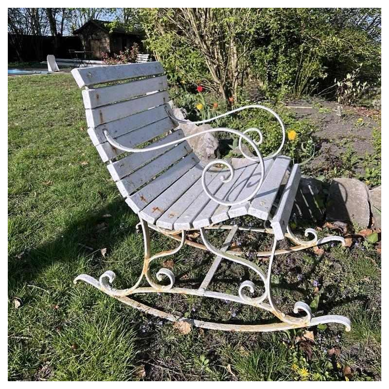 Wrought iron rocking armchair with scrolls, late 19th c