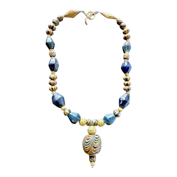Necklace of very old glass beads, including a central JATIM or PELANGI bead in 4 colours