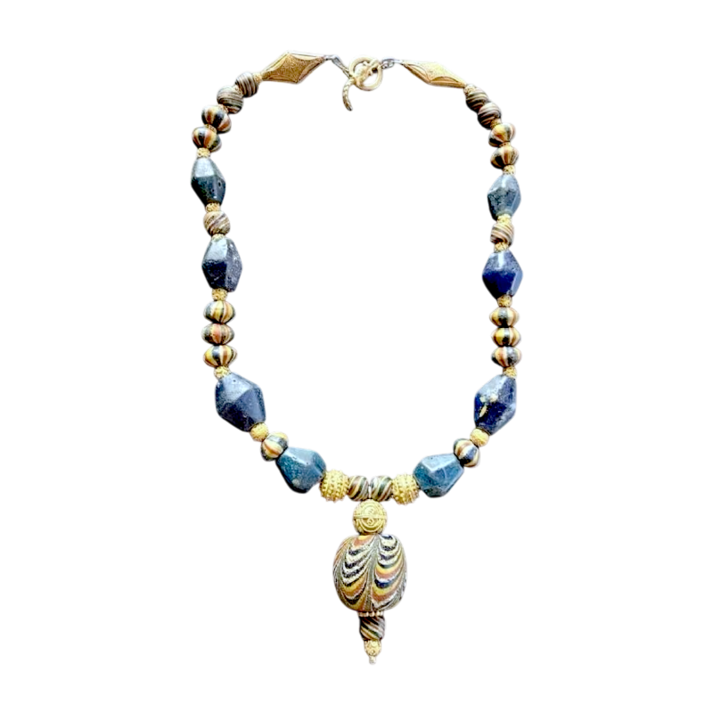 Necklace of very old glass beads, including a central JATIM or PELANGI bead in 4 colours