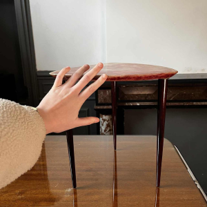 ALDO TURA, coffee/side table in red lacquered goatskin parchment, Italy ca 1950