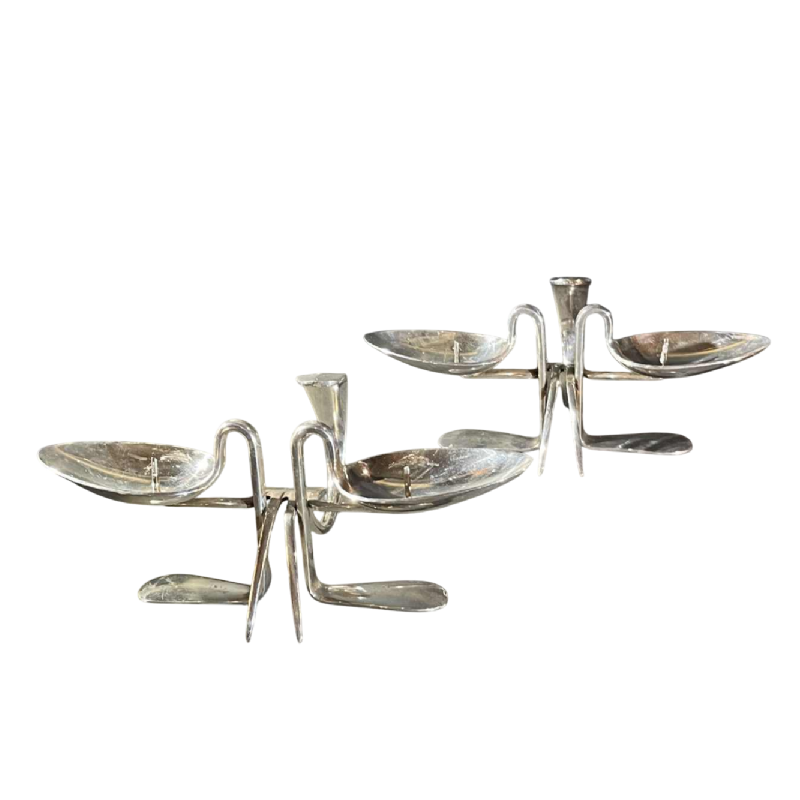 Paire de bougeoirs 'Couverts' en métal argenté, ca 1970