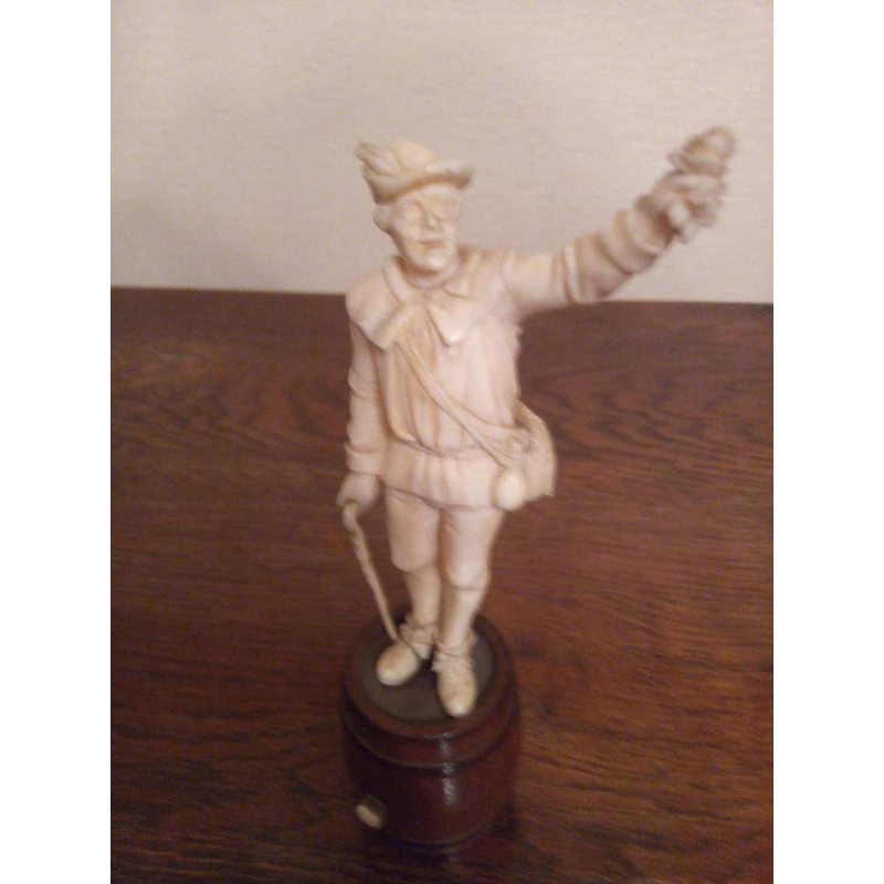 "Man with a rose" ivory figure sculpture, wooden barrel base, Nuremberg 18th c
