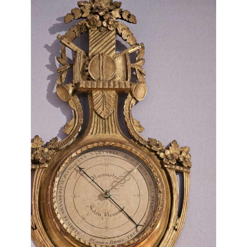 Barometer according to Reaumur in gilded carved wood by H. Calais, Bruges 18th century