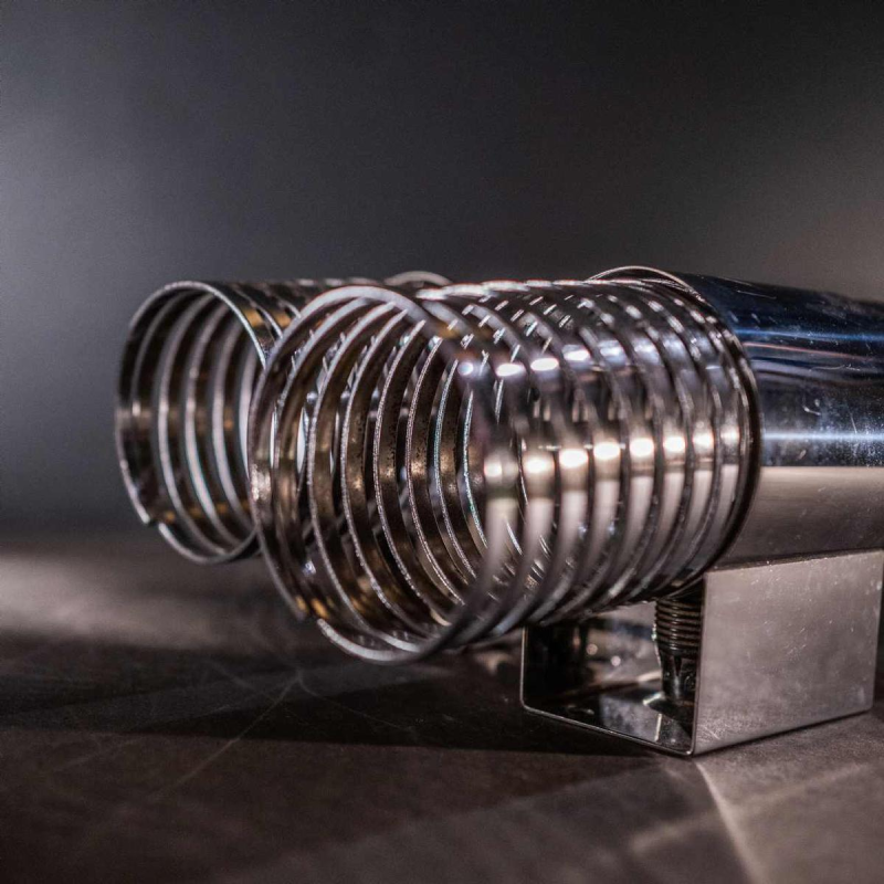 Pair of ' Spiral / Spring ' wall light sconces, chromed steel, Space Age ca 1970