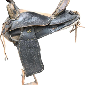 Vintage western horse saddle, richly decorated, mid 20th century