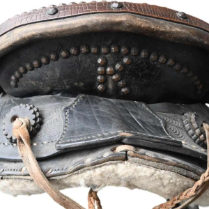 Vintage western horse saddle, richly decorated, mid 20th century