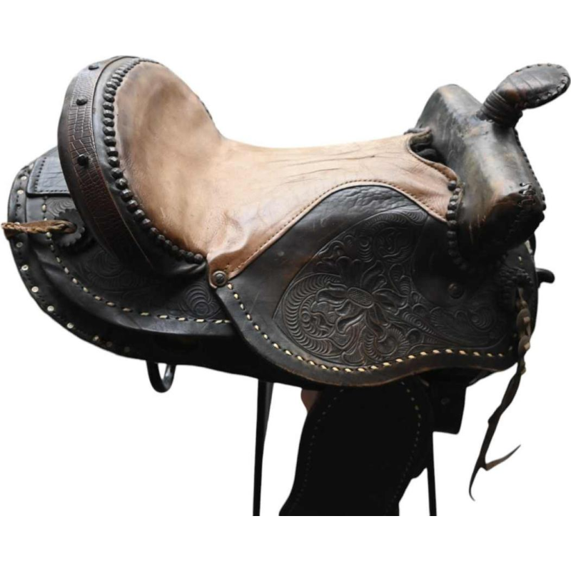 Vintage western horse saddle, richly decorated, mid 20th century
