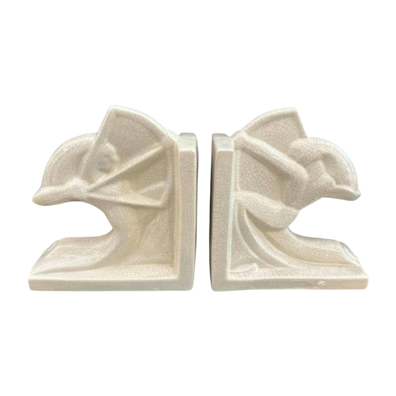 Louis Fontinelle 'Tireurs à l'arc' paire de serre-livres Art Déco en céramique faience craquelée, ca 1930
