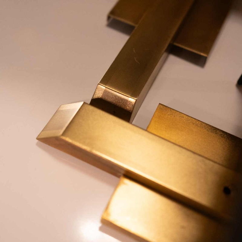 DEKNUDT, pair of gilded brass sconces / wall light, Hollywood Regency style, ca 1970