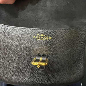 Delvaux zwart generfd lederen riemtasje