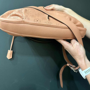 Louis Vuitton leather bag monogram old pink