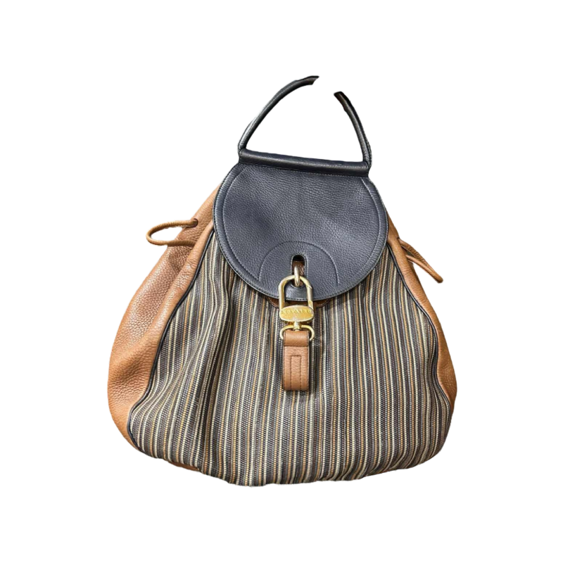 Delvaux, sac à dos en cuir marron et bleu marine