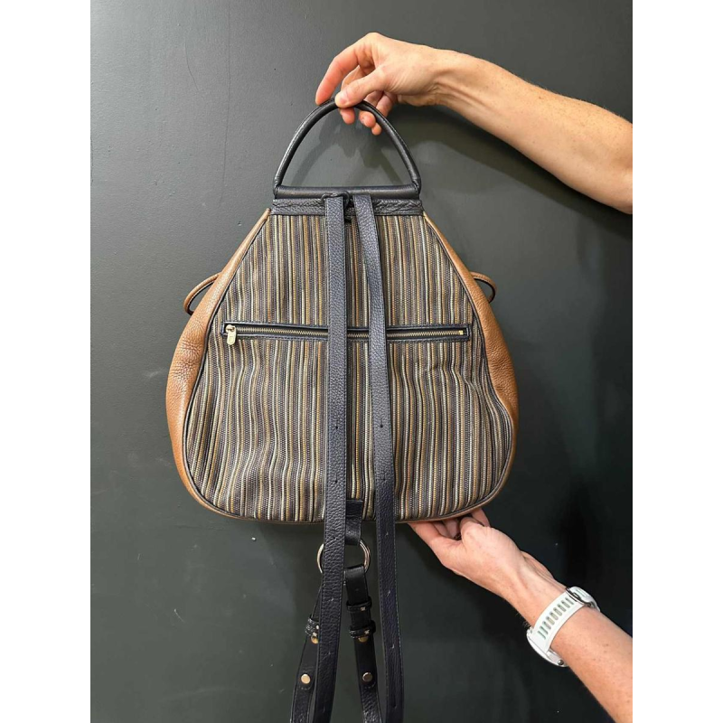 Delvaux, sac à dos en cuir marron et bleu marine