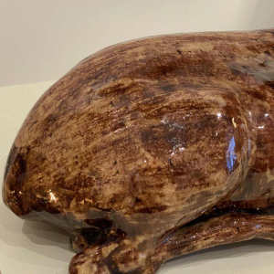 BAVENT, reclining doe with raised head, ceramic sculpture, 20th century