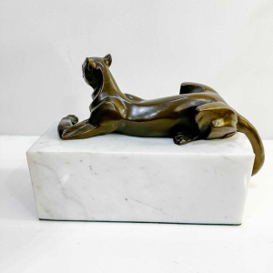 Juno ‘Lying panther’ bronze sculpture in the Art Deco style, white marble base