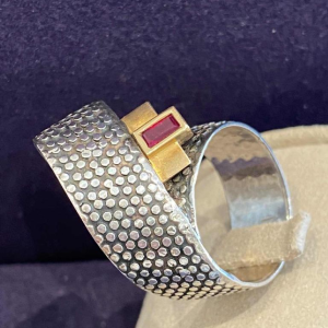 Janine Renard, modernist gold and silver ‘Ruban’ ring, emerald-cut ruby