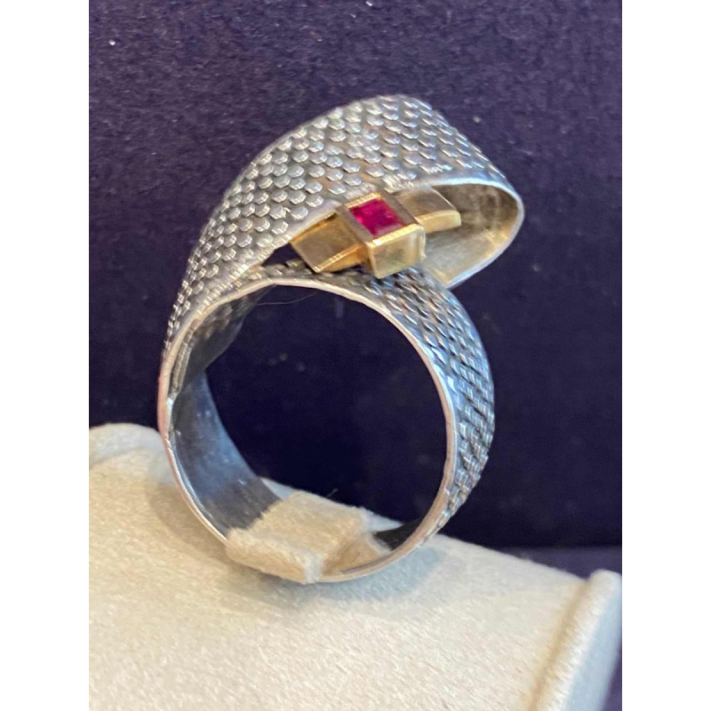 Janine Renard, modernist gold and silver ‘Ruban’ ring, emerald-cut ruby