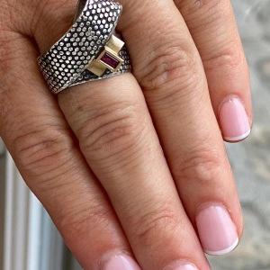 Janine Renard, modernist gold and silver ‘Ruban’ ring, emerald-cut ruby