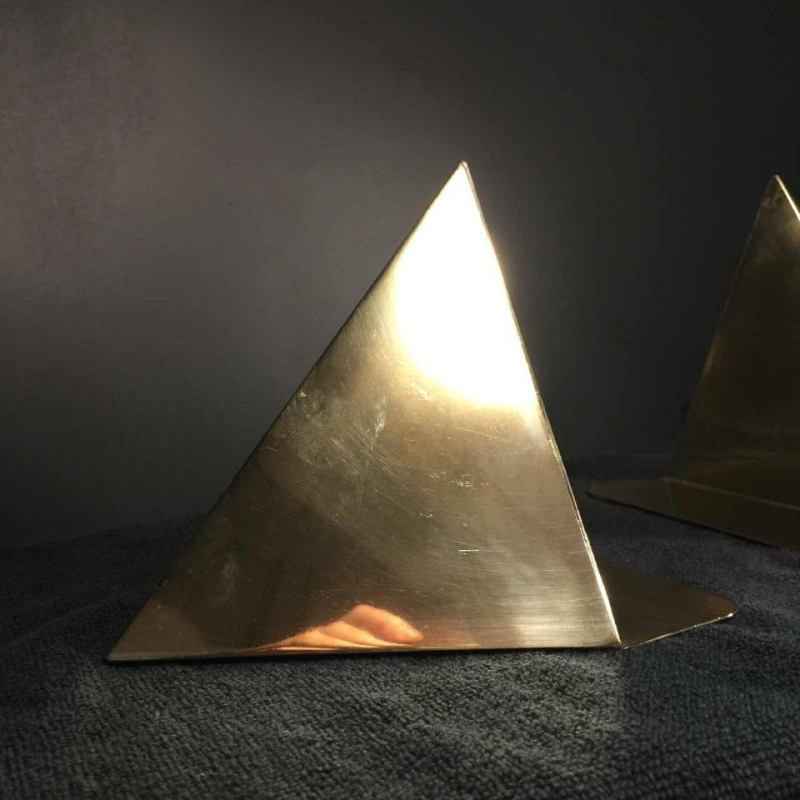 "Prisms", pair of bookends, design Cubist Modernist, brass, circa 1950