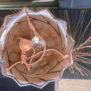 Art Deco ceiling light, pink pressed glass with stylised geometric floral motif, ca 1930
