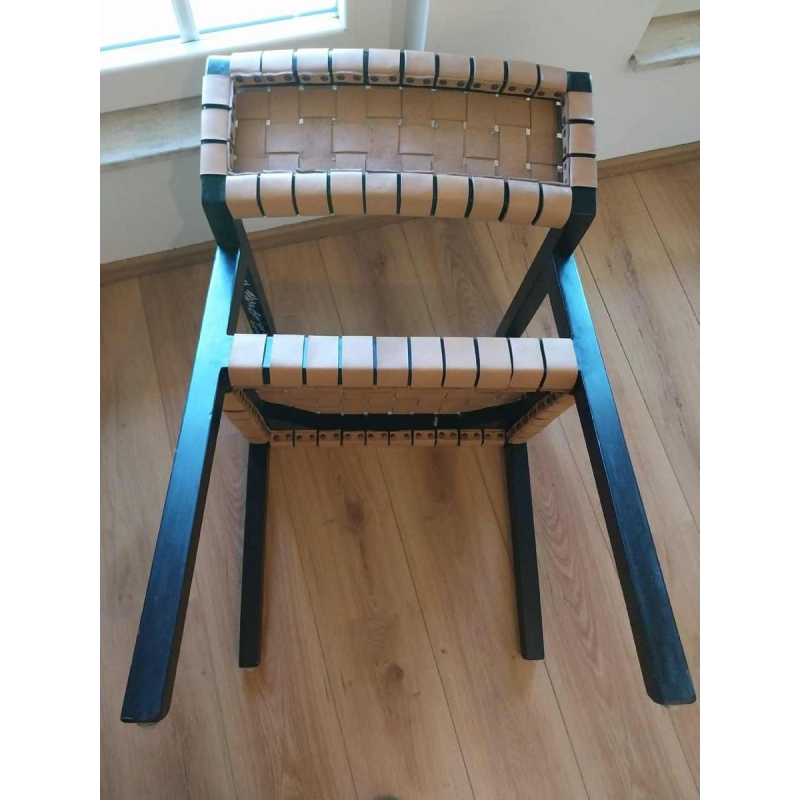 Olivier de Schrijver ‘Boss’ pair of armchairs, blackened wood and leather straps