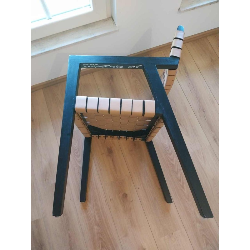 Olivier de Schrijver “Boss” paar fauteuils, zwartgebeitst hout en leren riemen