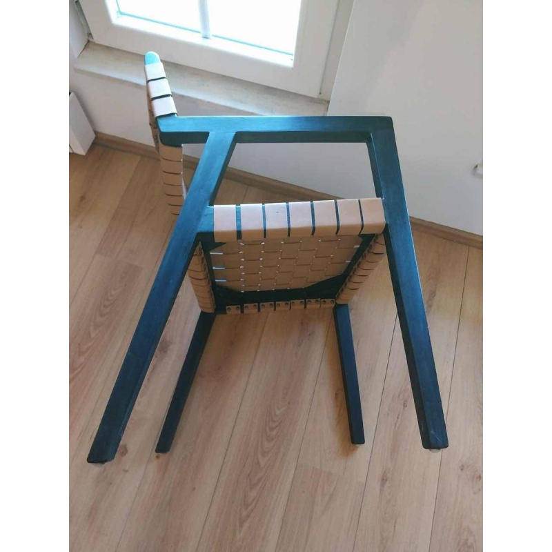 Olivier de Schrijver “Boss” paar fauteuils, zwartgebeitst hout en leren riemen