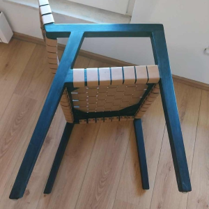 Olivier de Schrijver “Boss“ paire de fauteuils, bois noirci et lanières de cuir