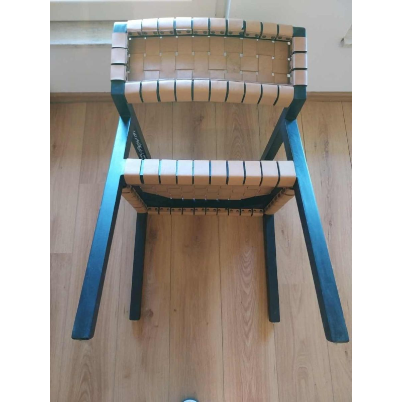 Olivier de Schrijver “Boss” paar fauteuils, zwartgebeitst hout en leren riemen