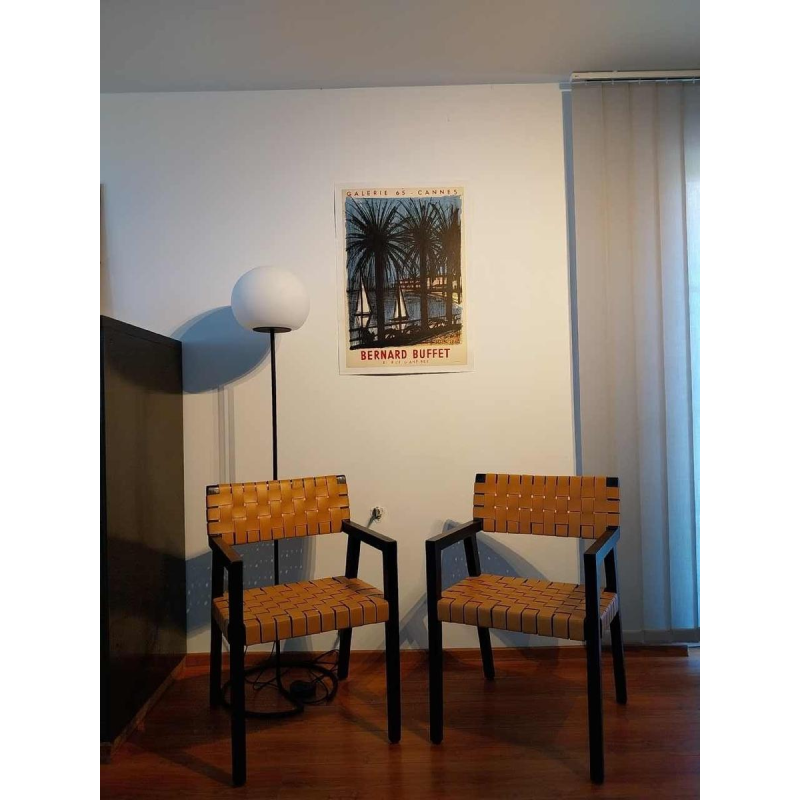 Olivier de Schrijver ‘Boss’ pair of armchairs, blackened wood and leather straps